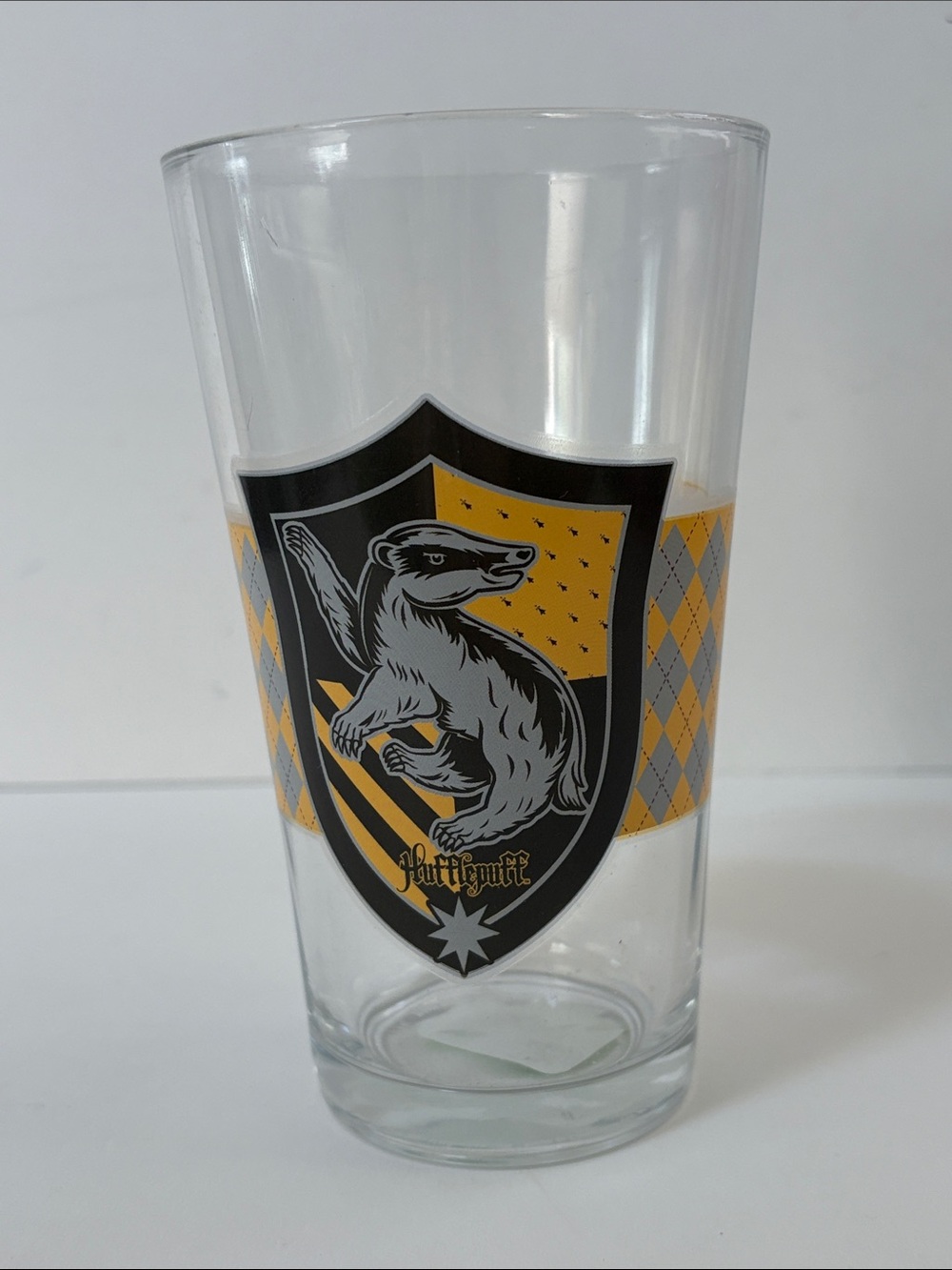 Rear find Hufflepuff Crest Pint Glass - Yellow & Black Hogwarts Design